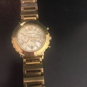 Michael Kor’s gold watch